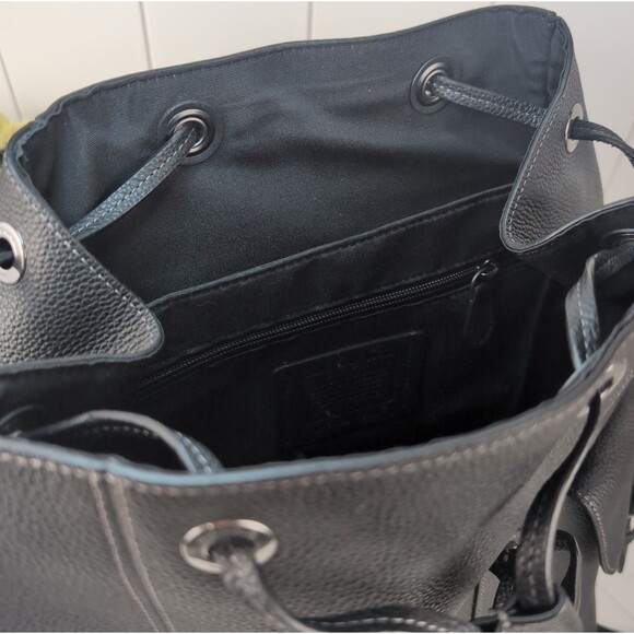 coach black hudson backpack || Outlet FASHION MYST Refined pebble leather Inside zip cell phone and multifunction pockets Inside tech sleeve Flap and drawstring closures fabric lining Top handle with 3 drop Outside flap pockets Outside zip access to interior Adjustable shoulder straps 11 3/4 (L) x 16 1/2 (H) x 6 (W) Style No. Coach Hudson Coach Backpacks Clearance